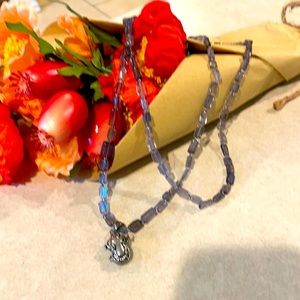 Beautiful purple glass beaded necklace with sliver cross pendant